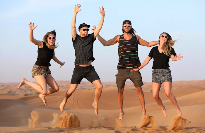 Premium Red Dunes by Quad Bike, Camel Ride, Sandboarding and BBQ 